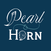 This is the restaurant logo for Pearl & Horn