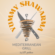 This is the restaurant logo for Yummy Shawarma & Grill