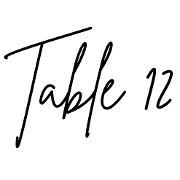 This is the restaurant logo for Table Twelve Kitchen & Bar